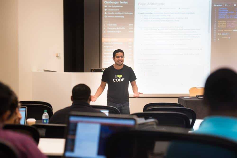 Presenter from iCode teaching a coding session